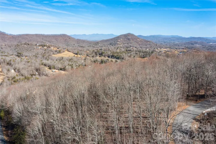 Near ridge line with gently sloping build site near road