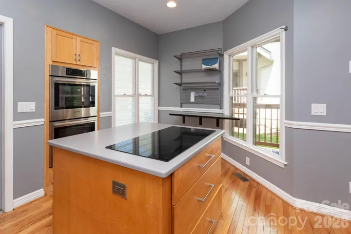A stunning kitchen featuring high-end appliances, including a Bosch double oven—perfect for cooking and entertaining.