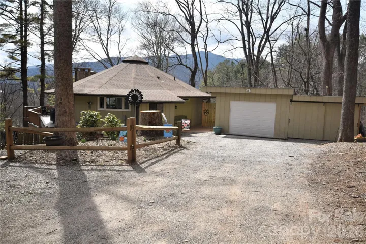 Home from gravel parking area