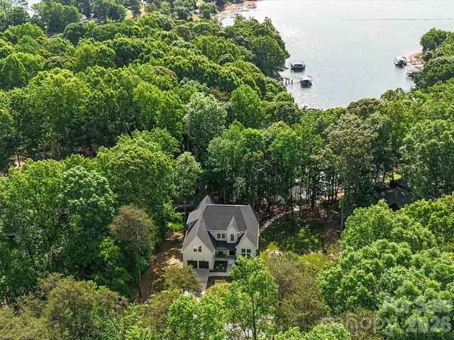 Aerial view highlighting the private wooded lot just a walk down to the shores of Lake Norman.