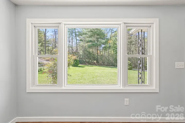 Living Room Window Looking outside to the Front Yard.