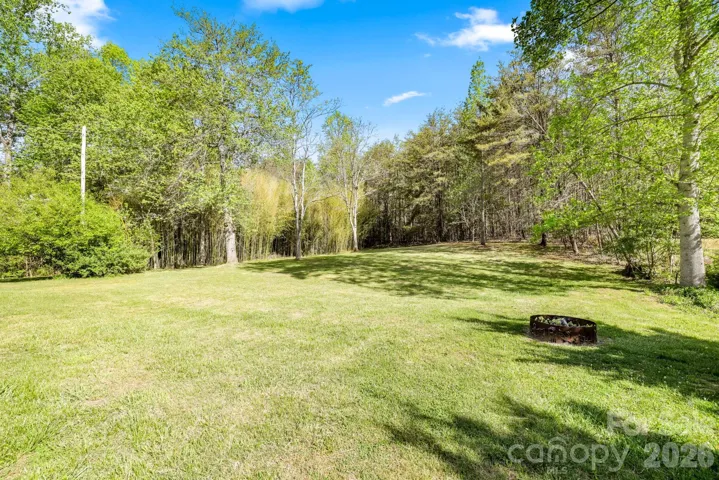 Off the Deck in the Back Yard is a Large Fire pit to enjoy all year round
