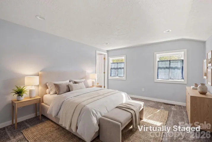 Bedroom is virtually staged.