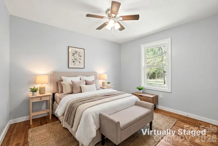 Bedroom is virtually staged.