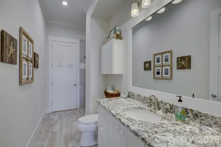 Bath #2 on main floor between bedrooms 2 and the office.