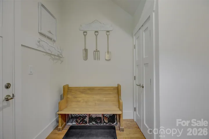 Drop Zone off garage with coat closet.