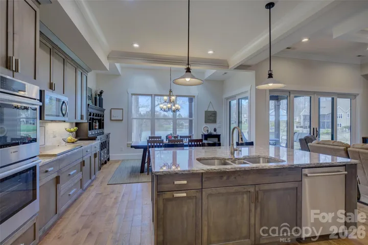 Kitchen with hardwood floors.