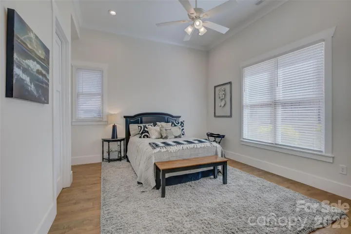 Office with closet and connects to full bath on the main floor with  hardwood floors.