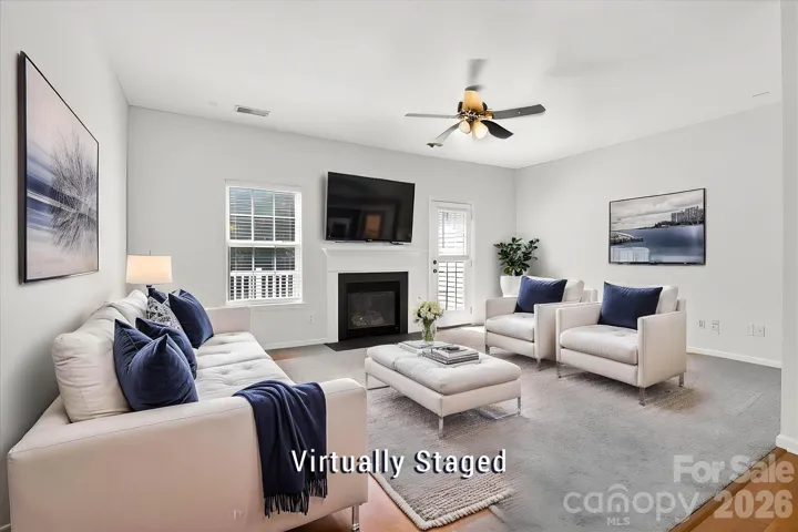 Living RoomVirtually StagedCarpet Flooring, no wood floor