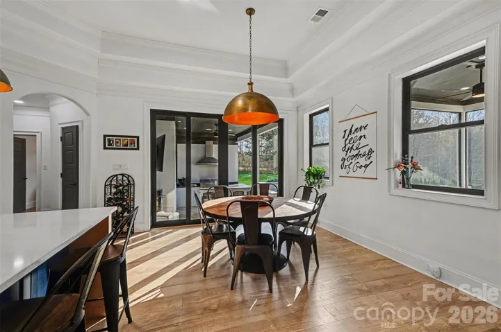 Dining just steps away from the pool and outdoor kitchen