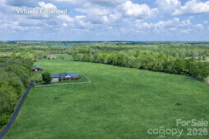 The Williams Family Farm ideally located in Union County between Marshville and Wingate close to the Hwy 74 expressway.  25.19 acres of crop land and woods.  This photo shows you how it might easily look if you chose to plant pastures instead of crops.