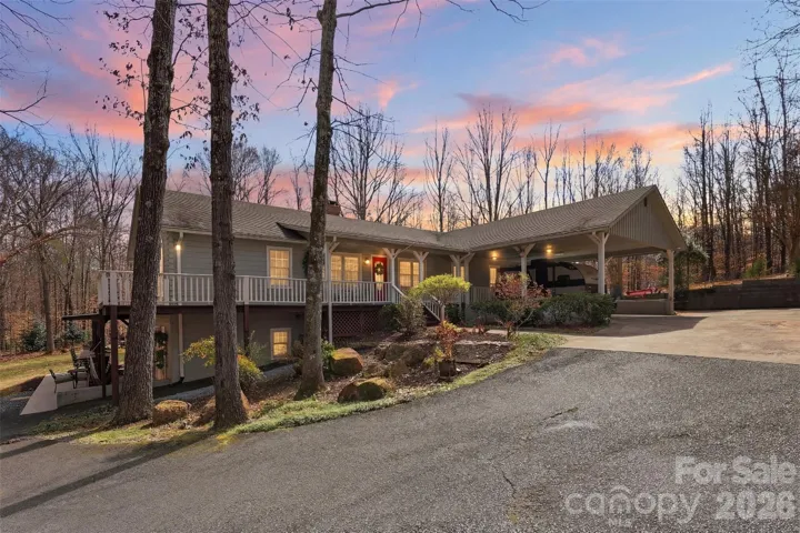 Private wooded approach welcomes you to this peaceful 2-acre property