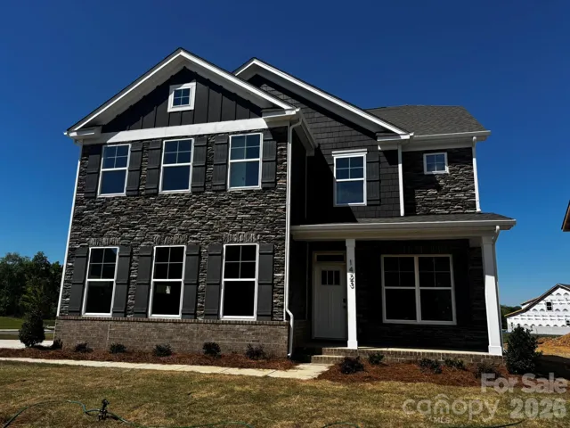 Homesite 72 features a 3-story Drexel plan with sideload garage.