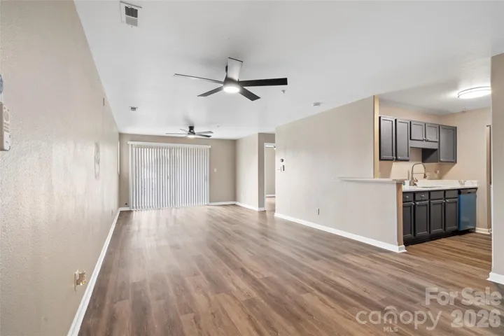 Expansive wide open living space with new floors