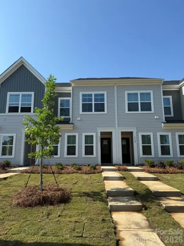 Homesite 6 features an interior unit Cannalily plan (under construction)