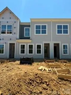 Homesite 6 features an interior unit Cannalily plan (under construction)