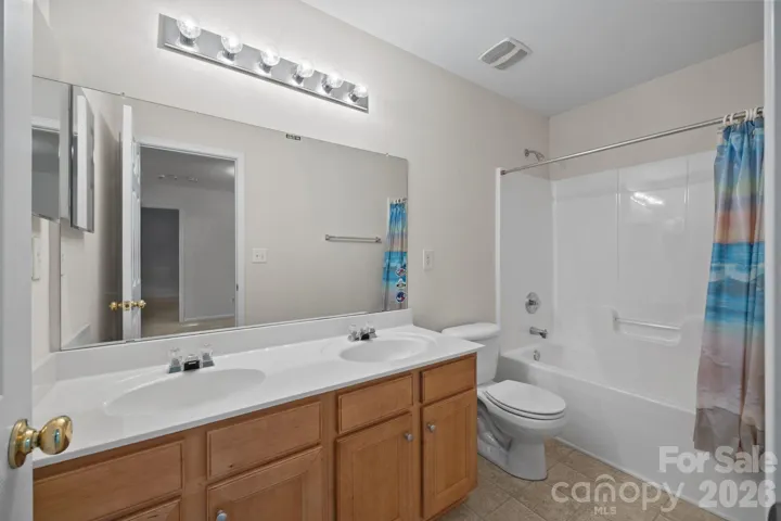Secondary Bathroom with dual vanities Upper Level