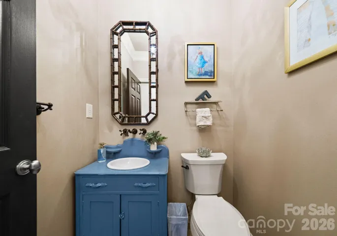 Main-level half bathroom.