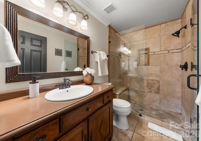 Upper-level shared full bathroom. 