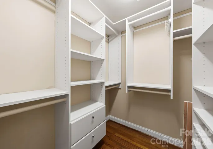 1 of 2 primary closets. 