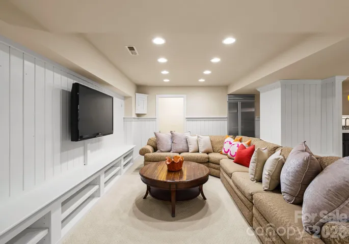 Lower-level entertainment area. 