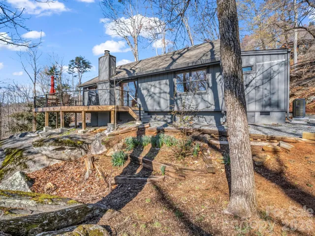 Where architecture meets nature—this home is uniquely grounded among impressive natural rock formations."