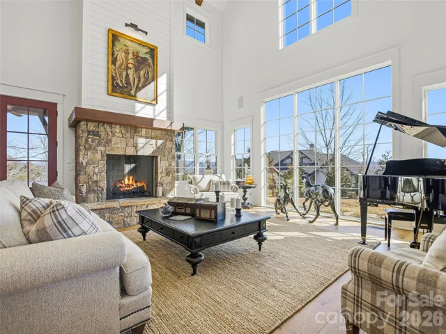 Great room with 42” wood-burning/gas fireplace—perfectly oriented to capture panoramic views