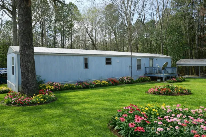 Yard and flowers virtually staged