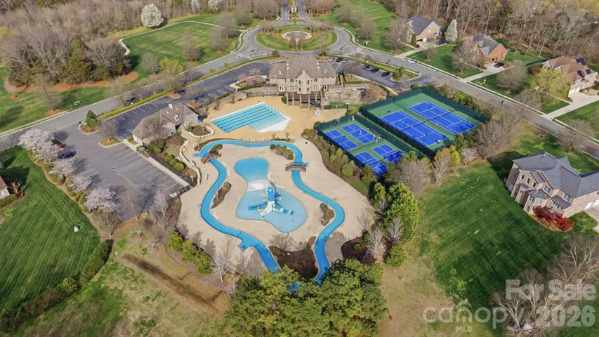 Premier community amenities including resort-style pools, clubhouse, tennis courts, and beautifully maintained green spaces—offering an exceptional lifestyle just moments from home.