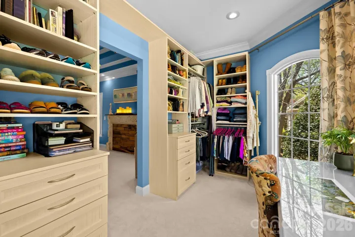 Custom closets in primary bedroom.