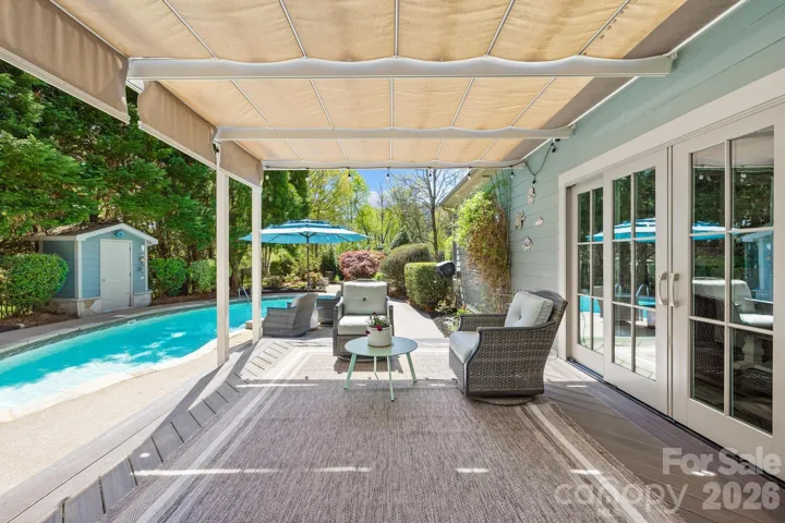 Low maintenance composite shaded deck off dining room.