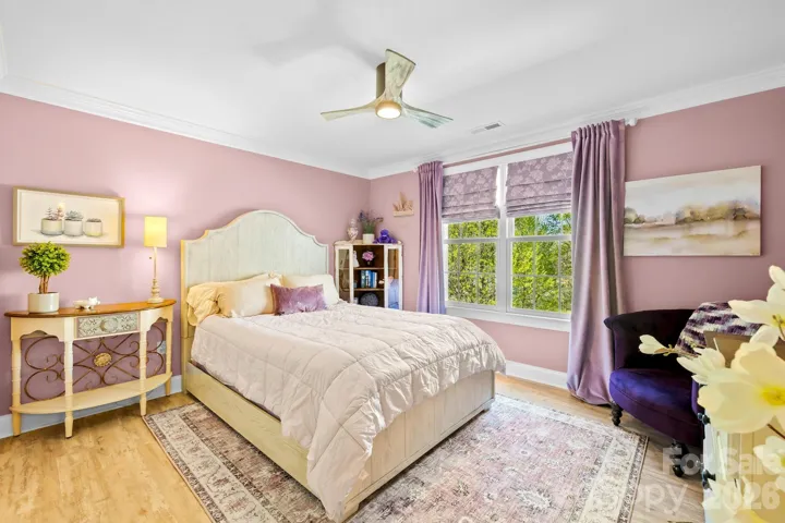 The 2nd bedroom (upstairs) is the first room on the left overlooking the front yard.