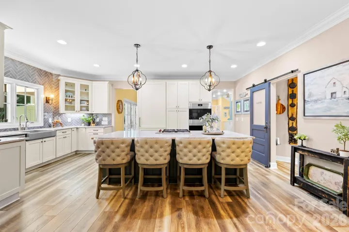 Large open DREAM kitchen with high-end appliances.