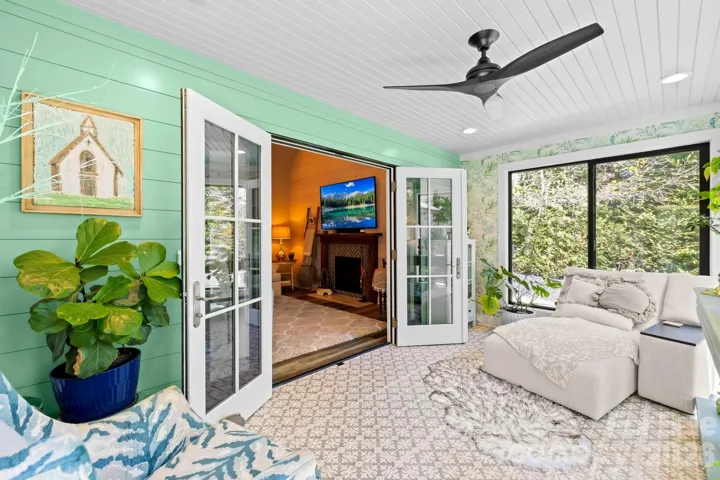 Bring the outdoors inside with the French doors connecting you to the new sunroom. Heated and cooled with a mini-split.