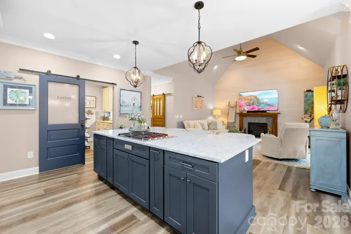This open kitchen has a great butler's pantry that can be closed off.