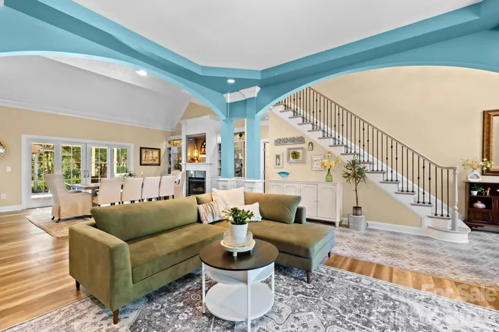 Front living room opened to dining room and foyer.