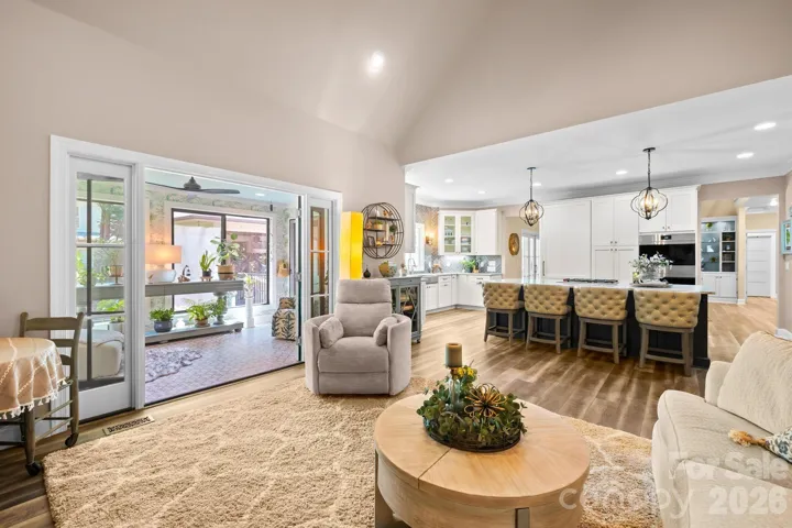 This room is open to the kitchen and connects to the sunroom