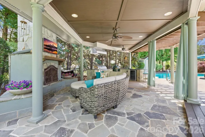 Cozy spot to curl up by the fire after a day poolside.