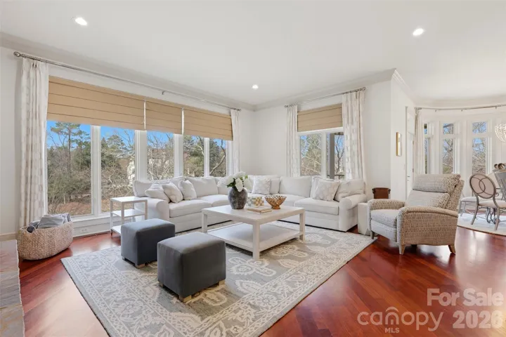 Open sight lines from living to kitchen to outdoors. The floor plan flows.
