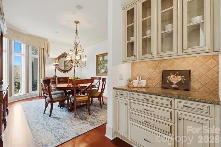 Formal dining with its own space and butler's pantry. This room has a backdrop.