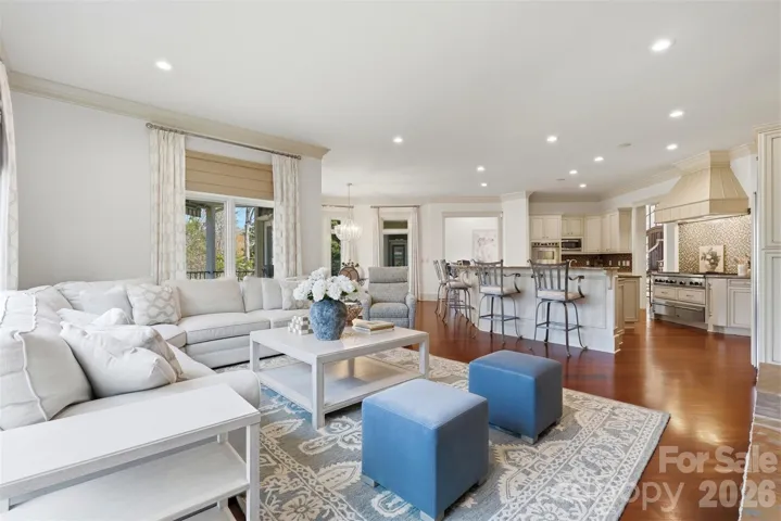 Cherry hardwoods run uninterrupted through the main level.