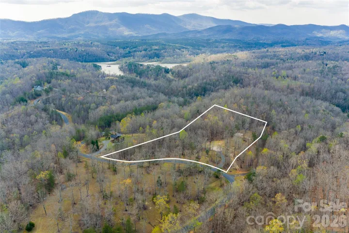 Private 3.79-acre homesite with septic, well, and driveway in place.