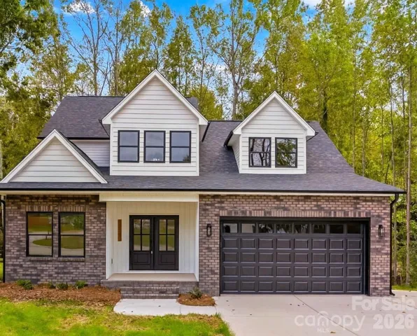 Gorgeous Craftsman inspired farmhouse home with open plan & 5 Bedrooms plus Bonus/Office, 3.5 Baths & large 2 Car Garage & tucked on a quiet street in China Grove.