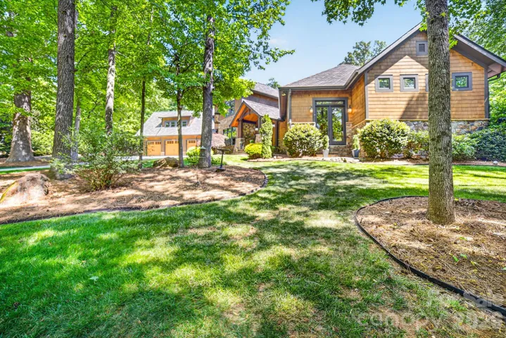 Located in the gated neighborhood of Stillwell, one of 36 homes all on 2-4 acre lots and surrounded by million $+ homes. The exterior is stone and cedar shake with board and batten accents with an insulated 3 car garage. with epoxy coated flooring and an ample parking area. •Situated on 94 acres of rolling hills, lush forest and scenic meadows, this gated neighborhood is protected by (5) nature and wildlife preserve within 3 miles.  Stillwell is next to the Buckeye Nature Preserve Trail, very close to a good selection of top public and private schools, 3.3 mi. from Lake Norman boat access, 4.8 mi. to award winning shopping and dining and 14 mi. to uptown Charlotte.