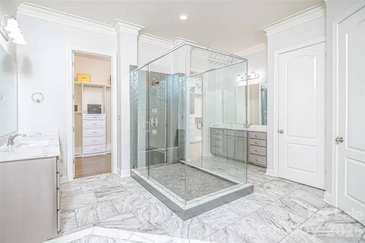 Primary Bath with peninsula shower.