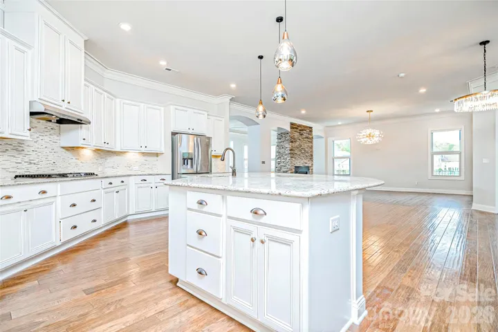 Kitchen with view of great room.