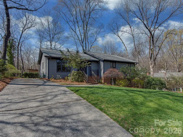 This charming ranch, is perfectly set on a beautifully landscaped lot with a long, inviting driveway and mature trees that create a sense of privacy and tranquility. Nestled in the heart of Stonehaven, this home offers a peaceful, tucked-away feel while still being close to everything.