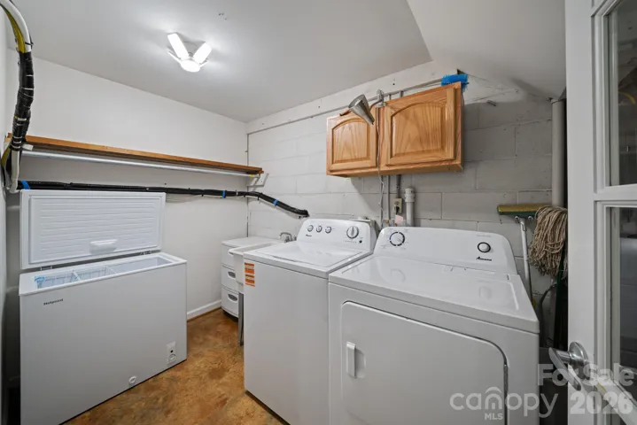 Lower Level laundry room accessable from main level and lower level.