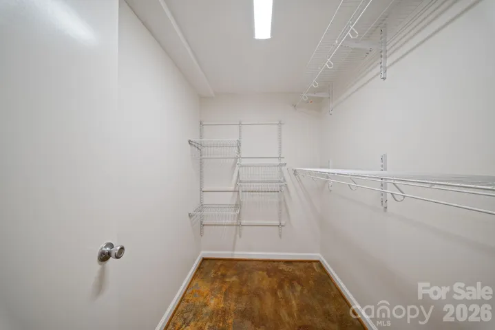 Lower level bedroom walk-in closet.