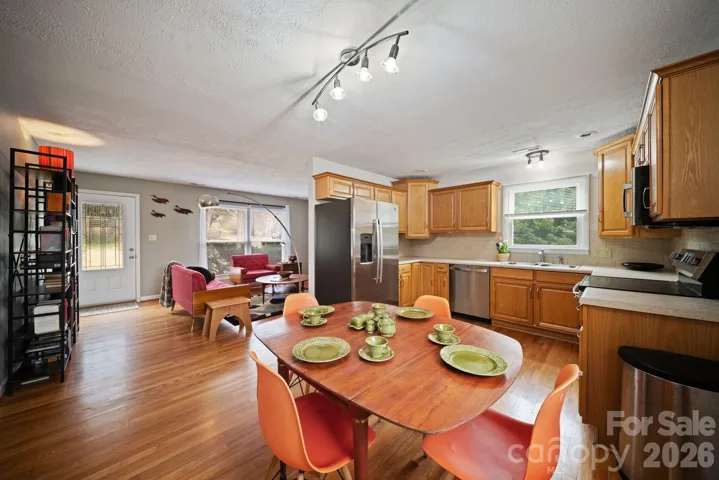 View of Dining area & Kitchen from rear entrance.
